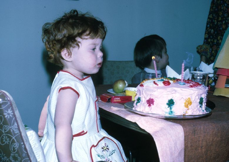  blowing out birthday candles
